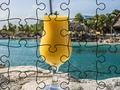 Logħba Jigsaw Puzzle Fuq Il-Bajja  onlajn