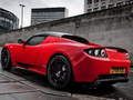Logħba Tesla Roadster Slide onlajn