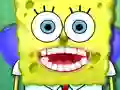 Logħba Spongebob Tooth Surgery onlajn