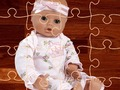 Logħba Jigsaw tal-Pupa Tarbija  onlajn
