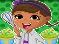 Logħba Dottie Doc McStuffins Cupcake Maker onlajn