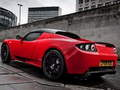 Logħba Tesla Roadster Slide onlajn